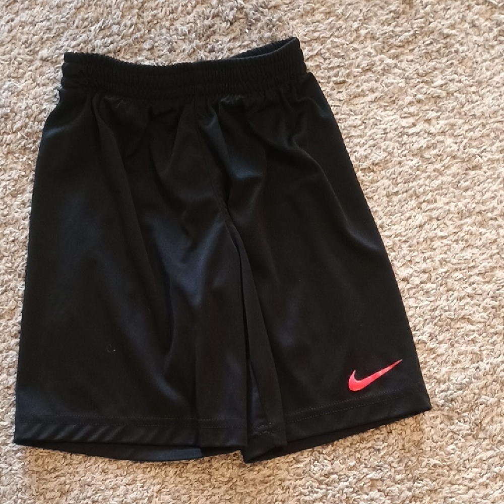Nike Black Athletic Shorts with Pink Swoosh Accent